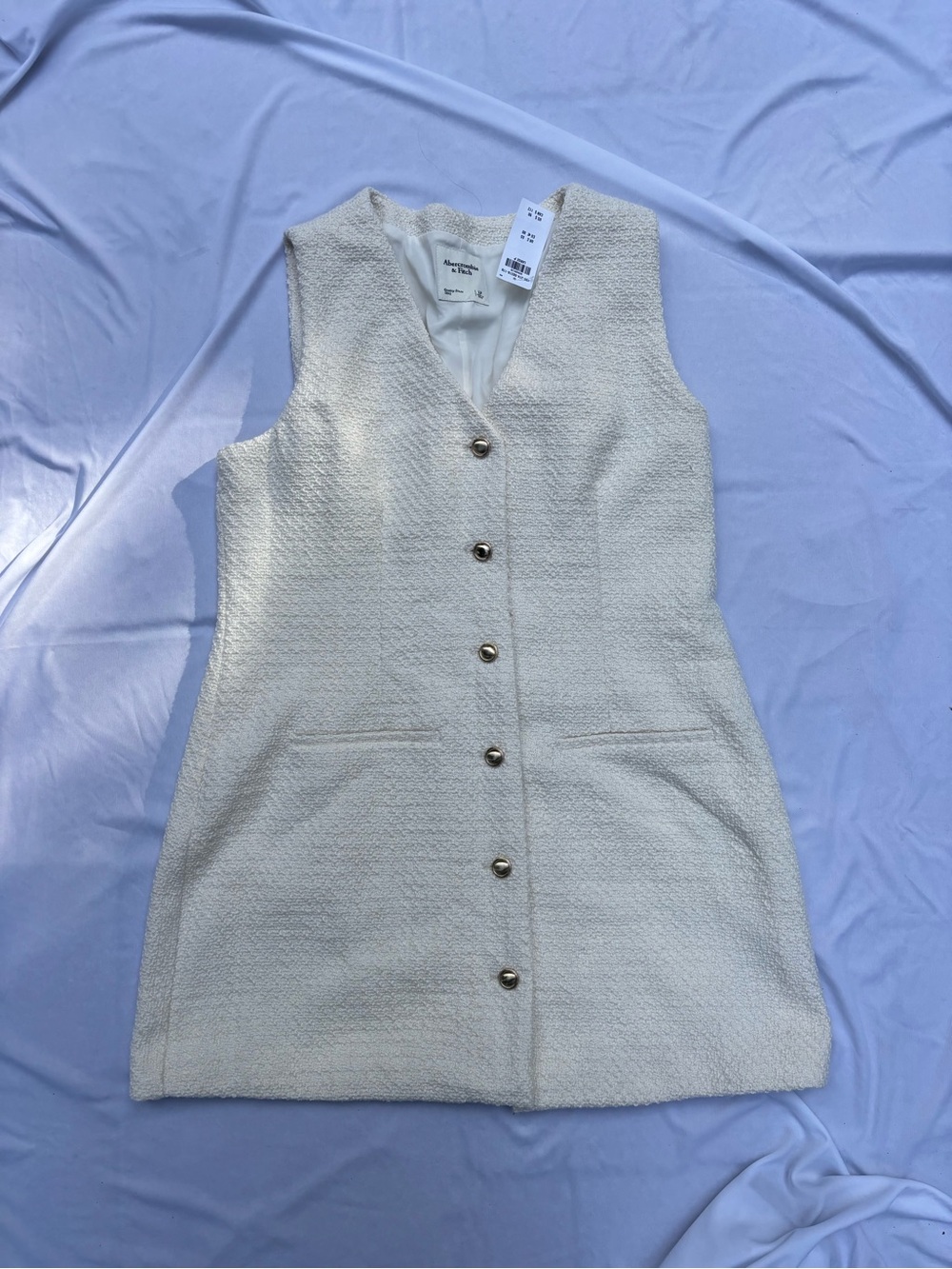 Sleeveless button up tweed dress